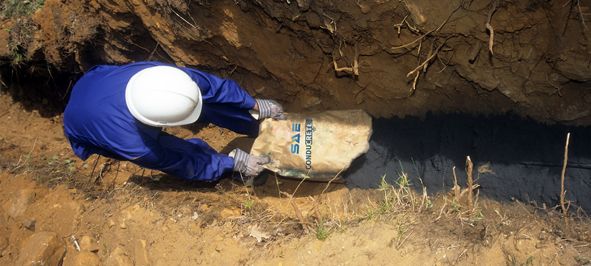 Man laying Conducrete | SAE Inc.